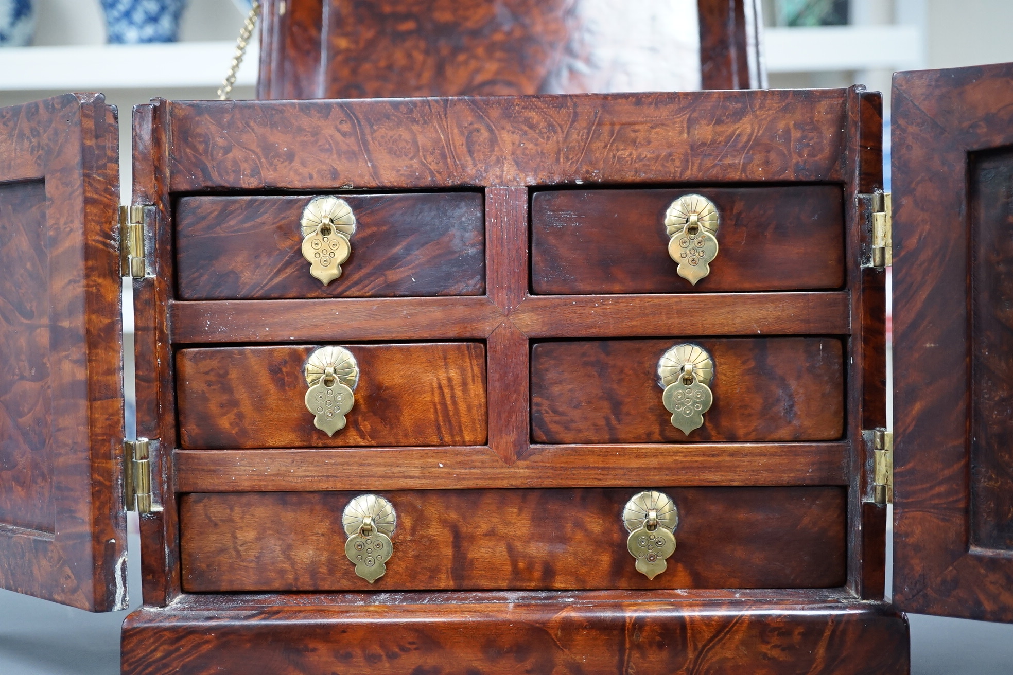 A Chinese burrwood scholar's cabinet, 19th century